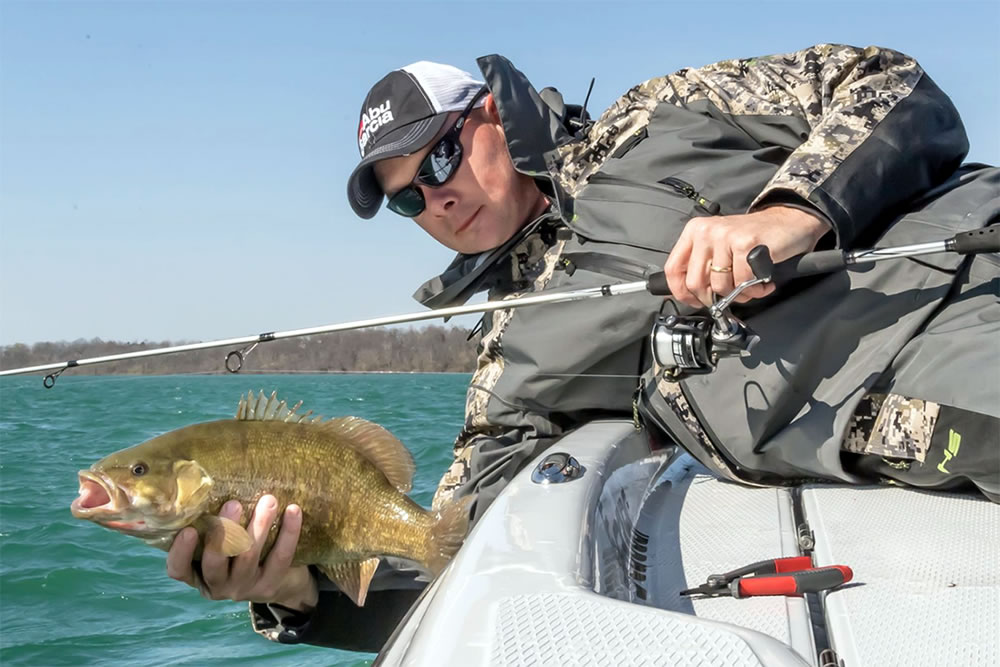 Look for smallmouth to concentrate on fast-breaking drop-offs that bridge shallow feeding areas with deep water in the main lake basin.