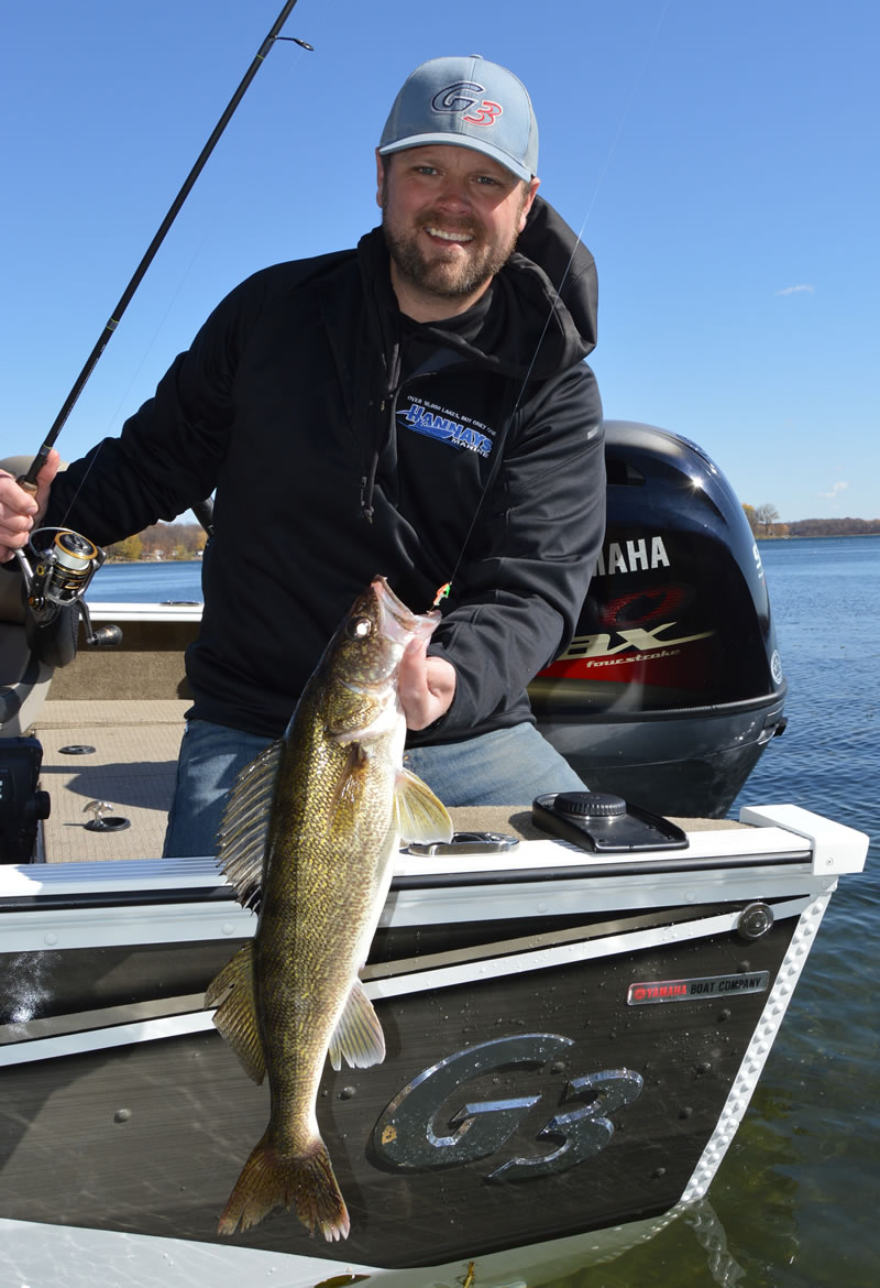 Tom Ferdinandt shows off an autumn walleye.