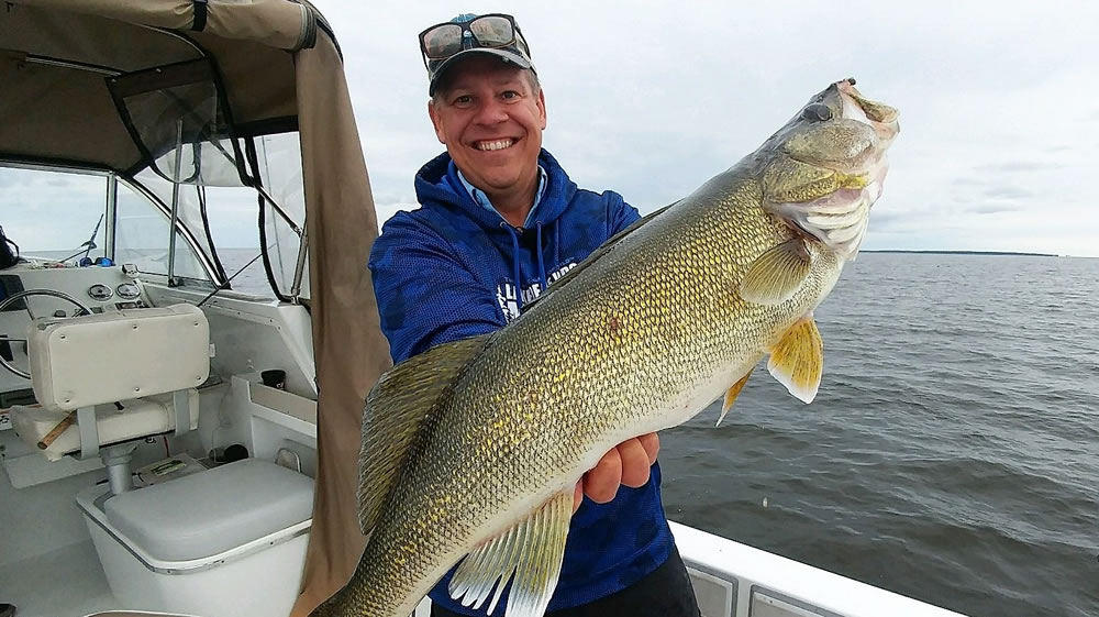 Joe Henry with a huge walleye caught on Lake Of The Woods Minnesota