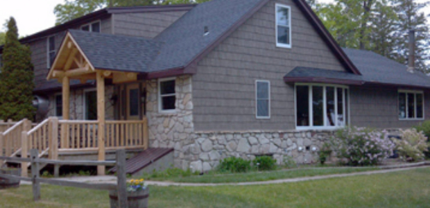 Business Card: Sand Bay Lodge & Cottages